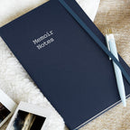 Writer's Journal with Memoir Notes on the cover. 